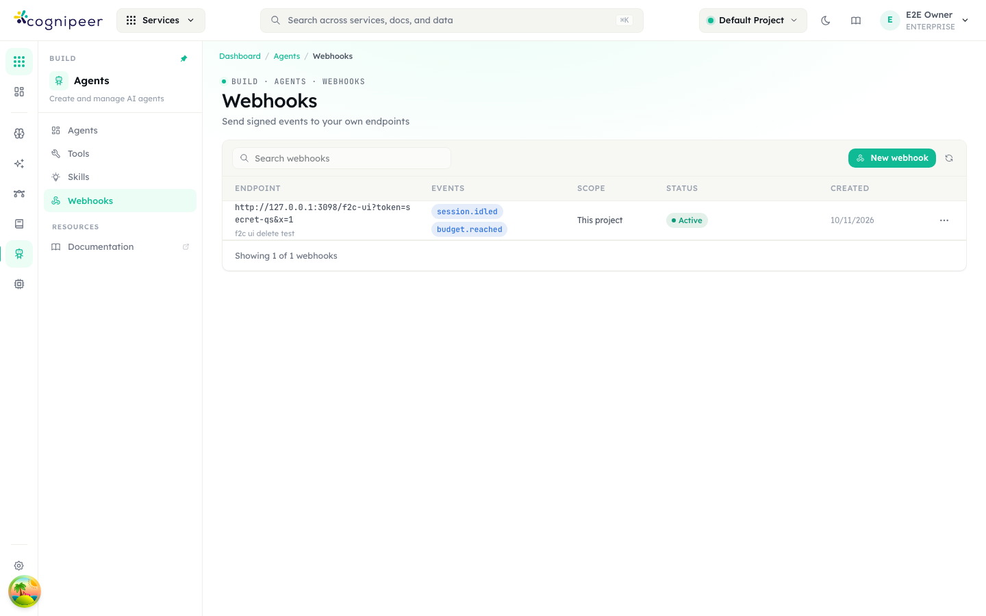 The Webhooks page under Agents in the Console, listing an endpoint with its events, scope and status